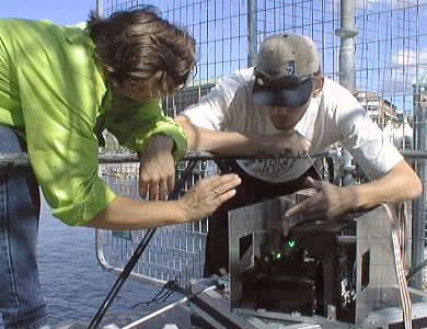 Adela and Jourgen adjust the scanning system