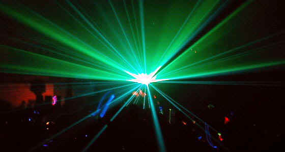 Laser F/X performing a scanned beam effect at the Sideshow rave in Winnipeg